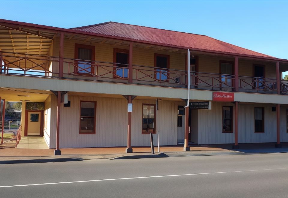 Mt Lyell Motor Inn verandah and Mining Hall sign on Orr Street